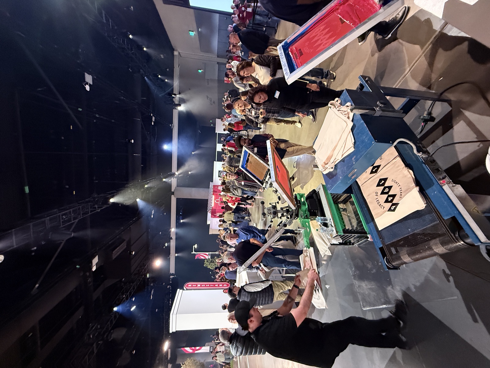 Guests lined up at a live Merch Troop activation for Live Heat Press