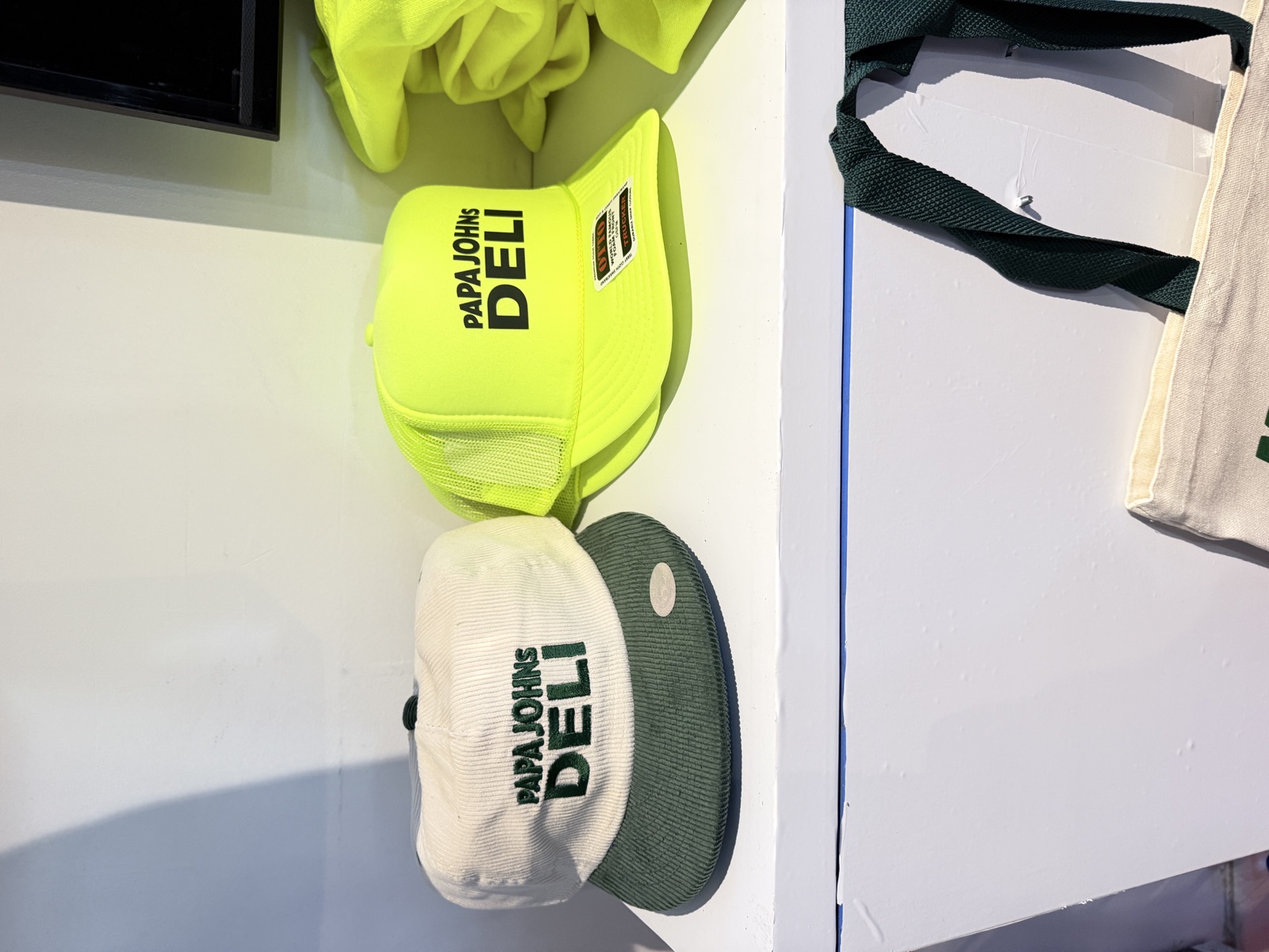 Finished shirts, hats, patches, and event merch for Live Heat Press